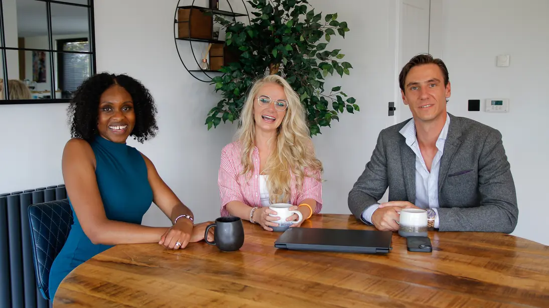 Darcie and Erwin of Go Ahead HiRe meeting with an international candidate in their Reutum office - representing the multilingual, multicultural European talent network